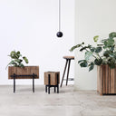Squarely all self watering products GrowWIDE GrowON GrowBIG planters with fresh green plants