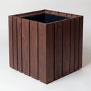 A square wooden planter box with dark brown vertical slats and a black interior, shown on a clean light gray studio background.