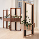 Solid oak Shoji room divider in L-shape with integrated GrowWIDE planters and green plants